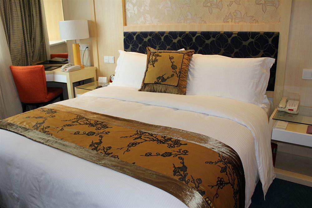 Puxi New Century Hotel Şanghay Oda fotoğraf